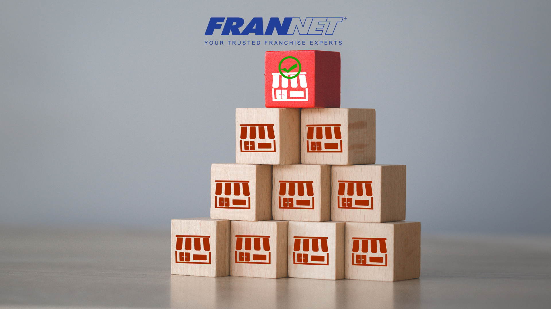 Pyramid stack of blocks representing businesses to display top emerging franchises