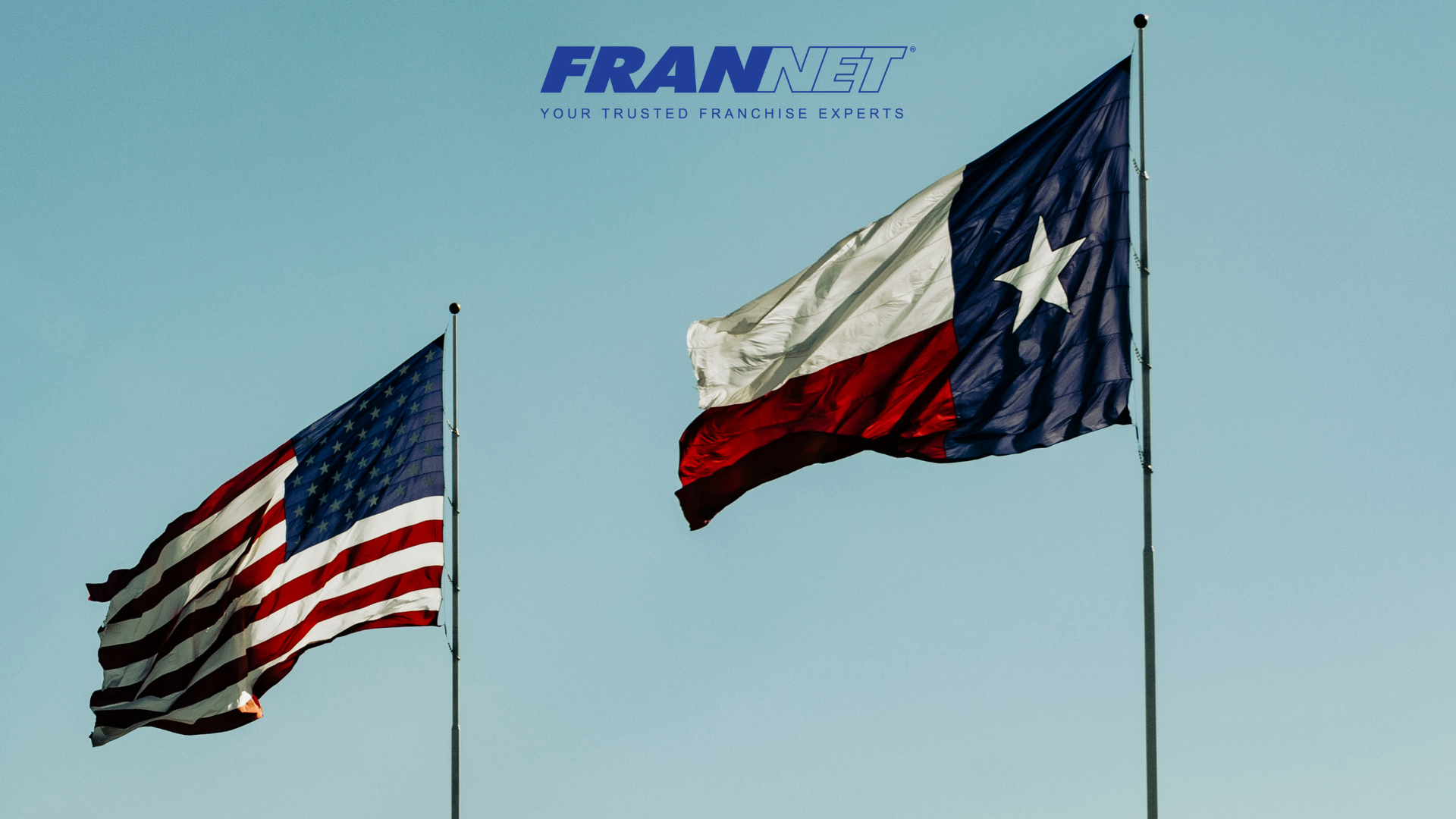 Picture of American flag and Texas flag on flagpole next to each other