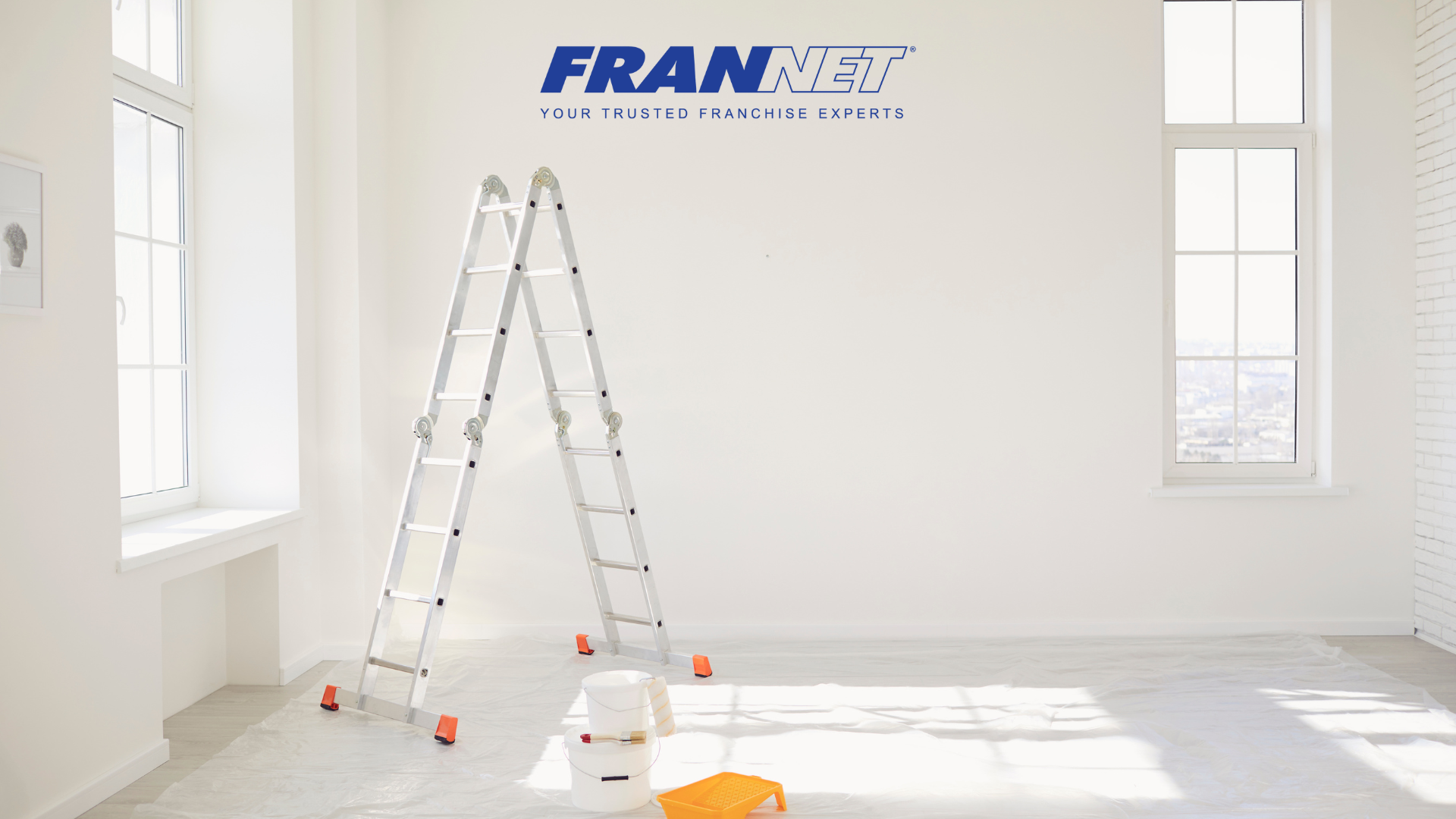 Ladder and bucket in empty room